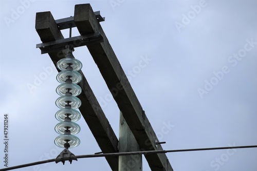 Fényképezés Power line with glass insulators and wires