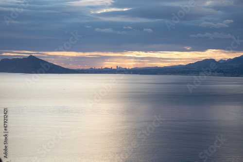 sunrise over the city of Benidorm from the Pe    n de Ifach  Alicante  Spain
