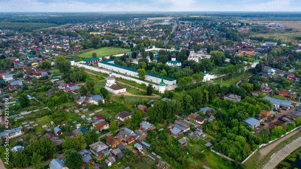 Top view of a scenic view from a drone on the city of Aleksandrov, one of the oldest cities in the Moscow region, Aleksandrovskaya Sloboda (Alexander Kremlin) - the residence of Tsar Ivan the Terrible