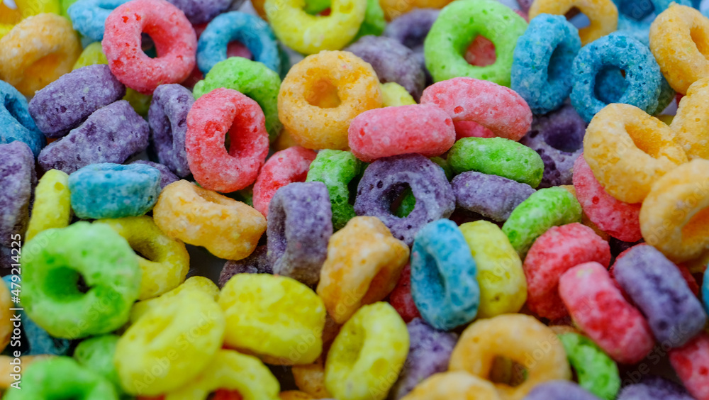 Colorful fruit sugary corn cereal rings. Highly detailed macro close up shot of this nutritious and delicious breakfast and snack favorite. 
