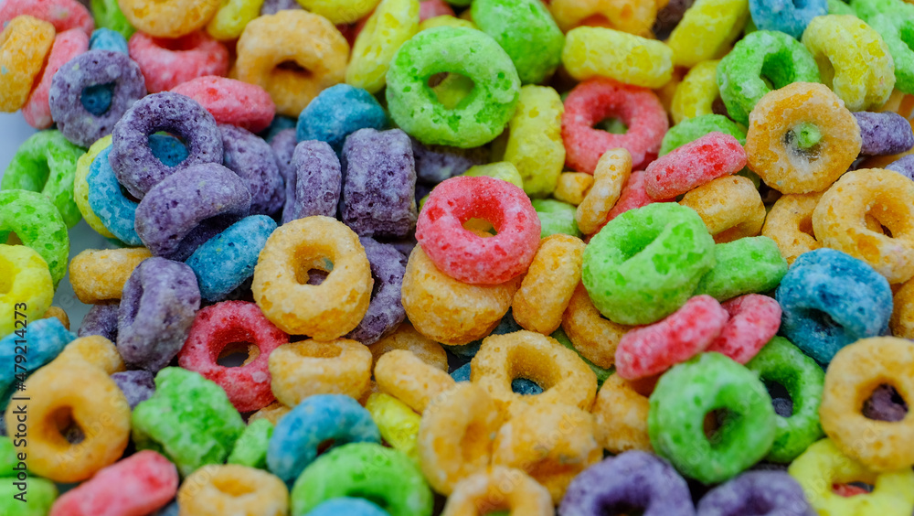 Colorful fruit sugary corn cereal rings. Highly detailed macro close up shot of this nutritious and delicious breakfast and snack favorite. 
