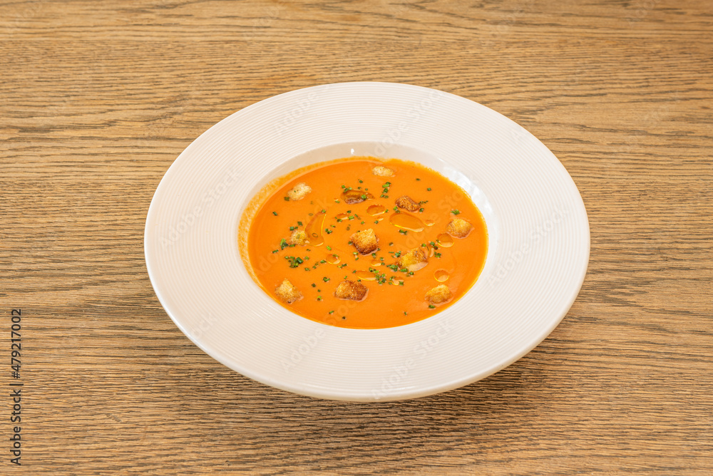 Gazpacho is a cold soup with various ingredients such as olive oil, vinegar, water, raw vegetables, usually cucumbers, peppers, onions and garlic Gazpacho is a cold soup with various ingredients such as olive oil, vinegar, water, raw vegetables, usually cucumbers, peppers, onions and garlic