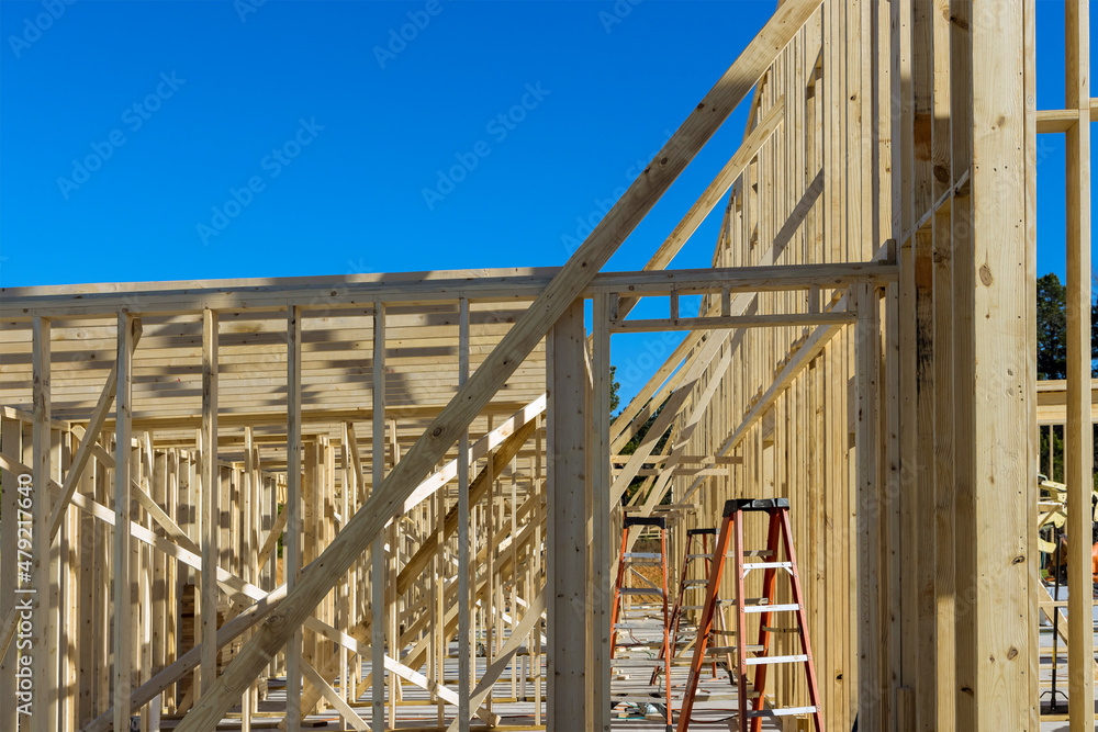 Framing beam of new house under construction home framing