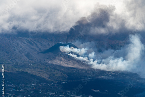 Active volcano of La Palma emitting ashes and steam photo