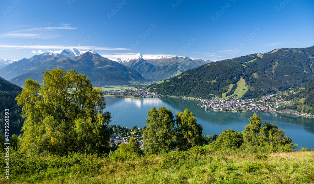 Idyllic summer alpine landscape with Lake Zell and the snow-covered Kitzsteinhorn, Zell am See, Austria, Europe Idyllic summer alpine landscape with Lake Zell and the snow-covered Kitzsteinhorn, Zell am See, Austria, Europe