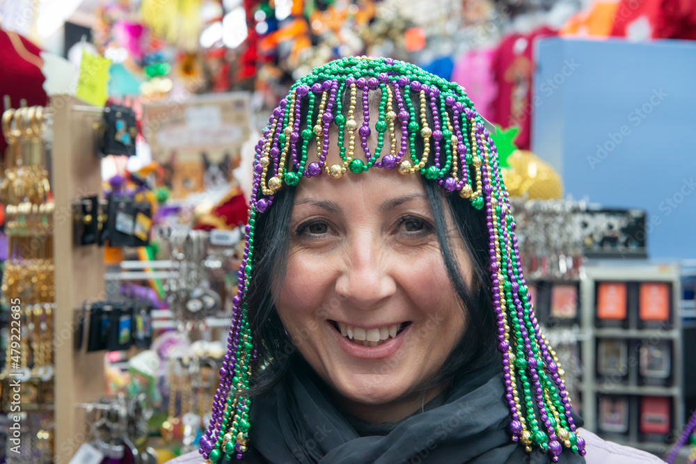 Happy woman in New Orleans for Mardi Gras carnival event.