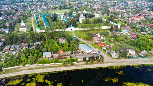 Top view of a scenic view from a drone on the city of Aleksandrov, one of the oldest cities in the Moscow region, Aleksandrovskaya Sloboda (Alexander Kremlin) - the residence of Tsar Ivan the Terrible photo