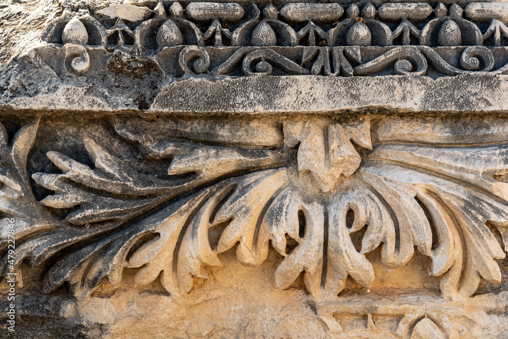 ancient floral ornament on the ruins of a building in the ancient city of Myra, Turkey