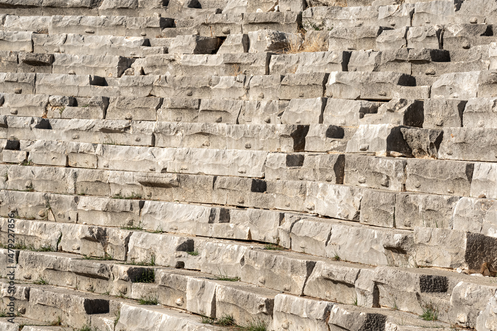 old stone tribunes of ruined ancient amphitheate in Myra, Turkey
