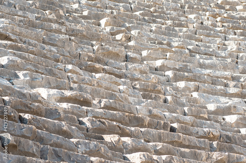 old stone tribunes of ruined ancient amphitheate in Myra, Turkey photo
