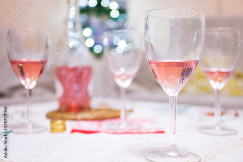 Glasses with rose wine after celebration and toast