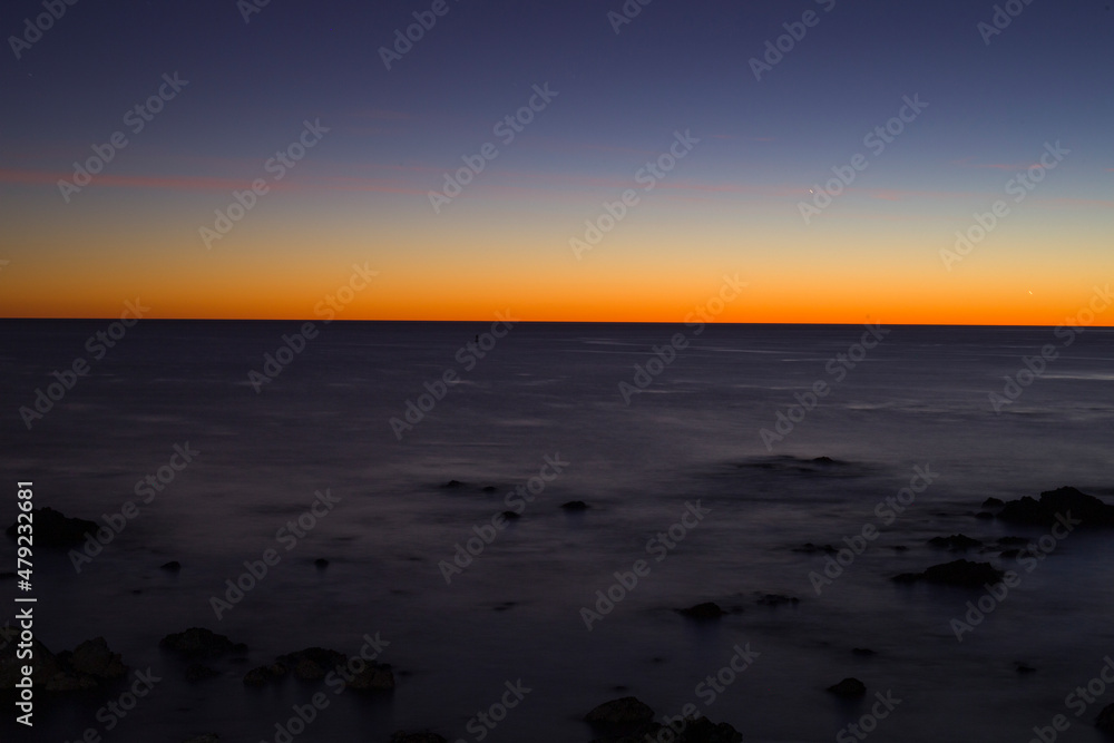 Obraz premium Beautiful sunset at the Pacific Ocean
