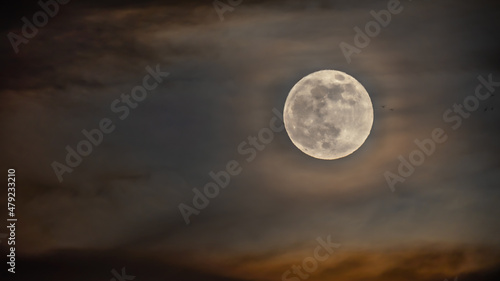 Moon and clouds photographed in different settings to capture both at night  © Larry D Crain