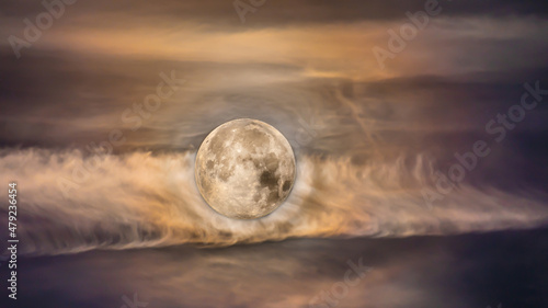 Moon and clouds photographed at different settings to have both show up 