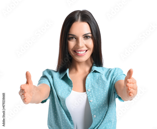 Young woman opening arms fo...