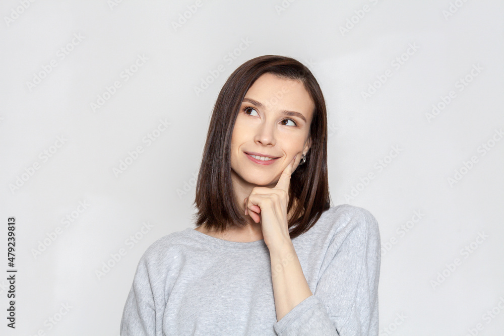 Brunette smiling woman on white background Brunette smiling woman on white background