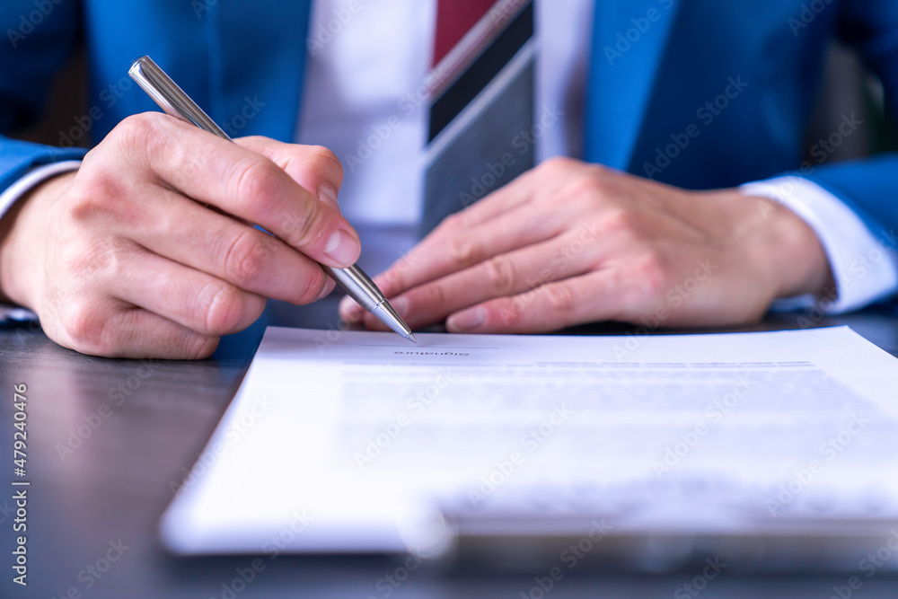 business man reading and signing a business contract, business agreement consensus signing, business concept and signing business man reading and signing a business contract, business agreement consensus signing, business concept and signing
