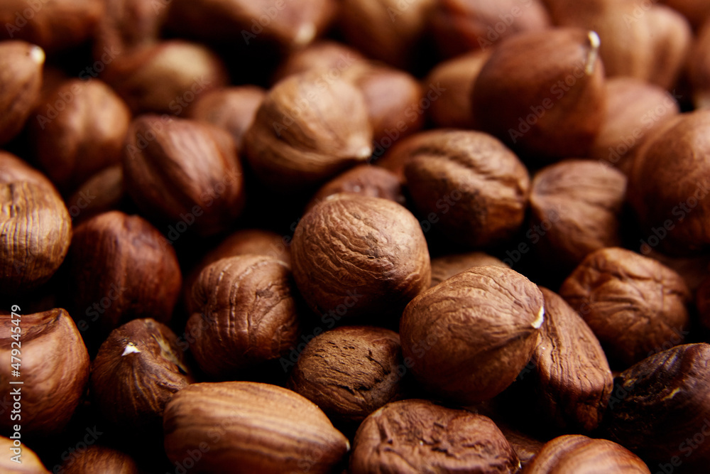 Shelled raw hazelnuts background closeup Shelled raw hazelnuts background closeup