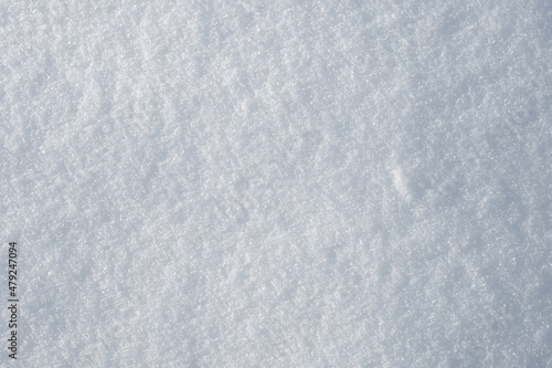 Background with a fragment of a flat snow surface