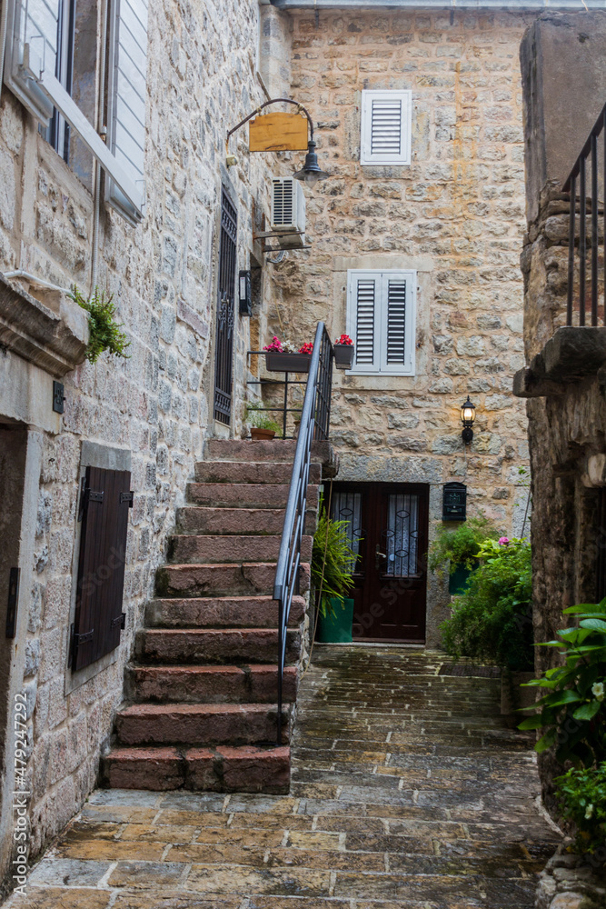 Fototapeta premium Narrow alley in Budva town, Montenegro.