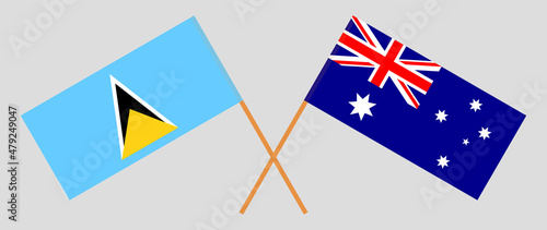 Crossed flags of Saint Lucia and Australia. Official colors. Correct proportion