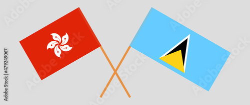 Crossed flags of Hong Kong and Saint Lucia. Official colors. Correct proportion