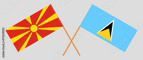 Crossed flags of North Macedonia and Saint Lucia. Official colors. Correct proportion