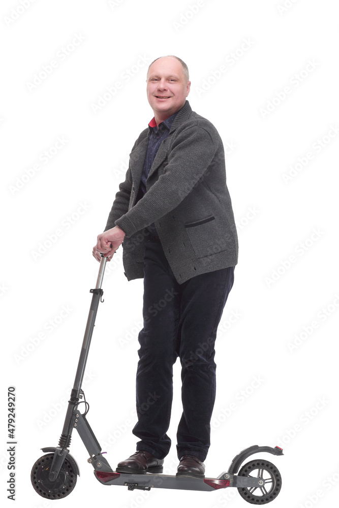 happy casual man with electric scooter .isolated on a white background. happy casual man with electric scooter .isolated on a white background.