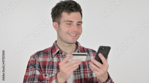 Portrait of Young Man with Successful Online Shopping on Smartphone