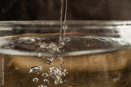 water pouring into glass © patoouupato