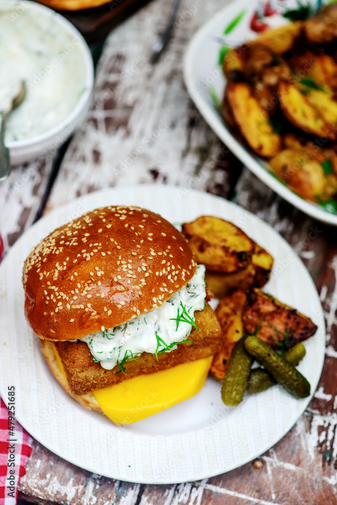 Fillet-o-fish and chips with tartare sauce. Fillet-o-fish and chips with tartare sauce.