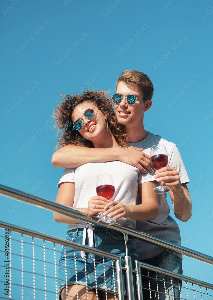Happy couple with wine glass on ship. Happy Valentine Day concept.