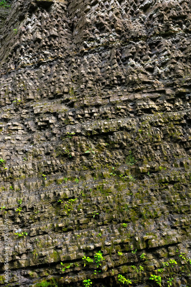 natural stone wall texture. grungy outdoor nature background natural stone wall texture. grungy outdoor nature background