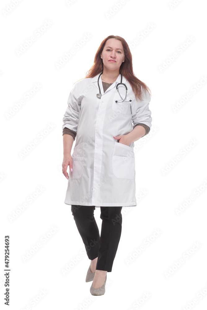 mature woman doctor striding forward. isolated on a white background. mature woman doctor striding forward. isolated on a white background.