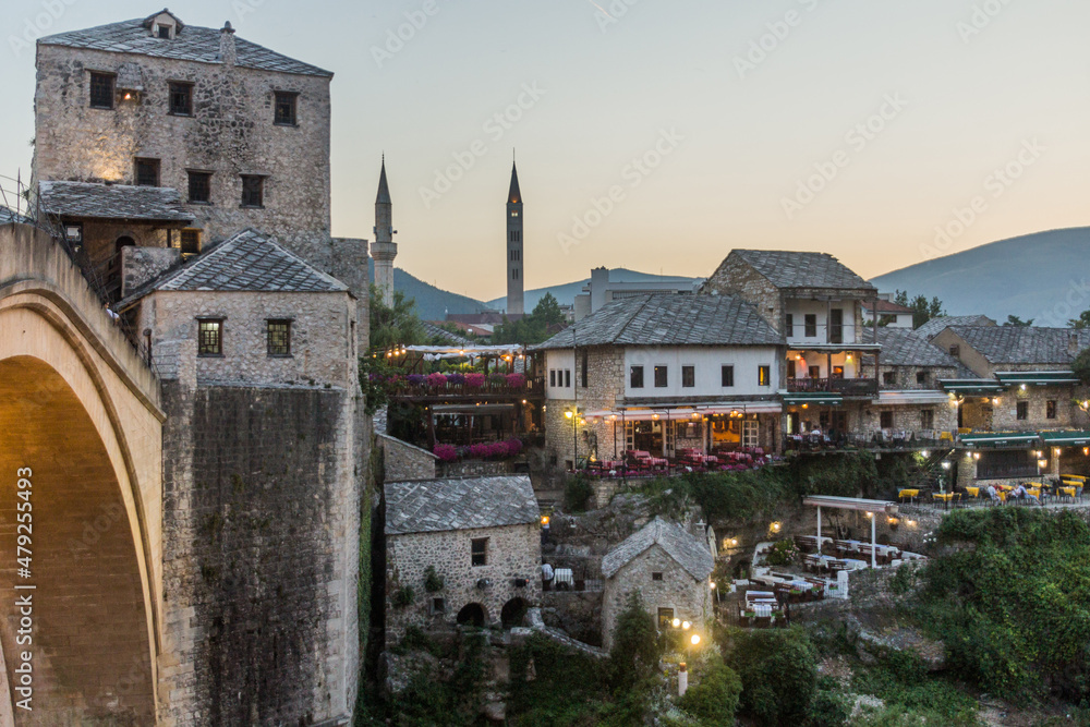 Evening view of Stari most (Old Bridge) and old stone buildings in Mostar. Bosnia and Herzegovina
