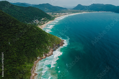 Scenic coastline with mountains and Atlantic ocean with waves in Brasil. Aerial view