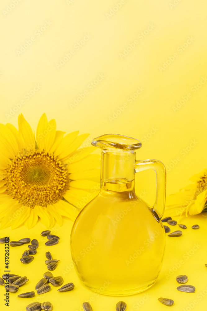 Sunflower oil, seeds and flower isolated on white background. Sunflower oil, seeds and flower isolated on white background.