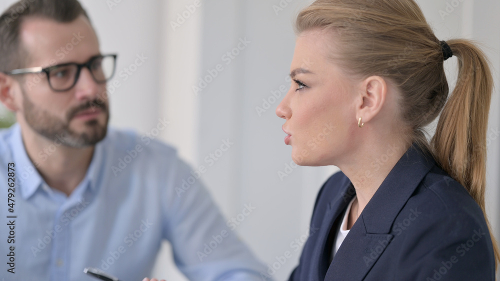 Close up of Businesswoman talking to Businessman Close up of Businesswoman talking to Businessman