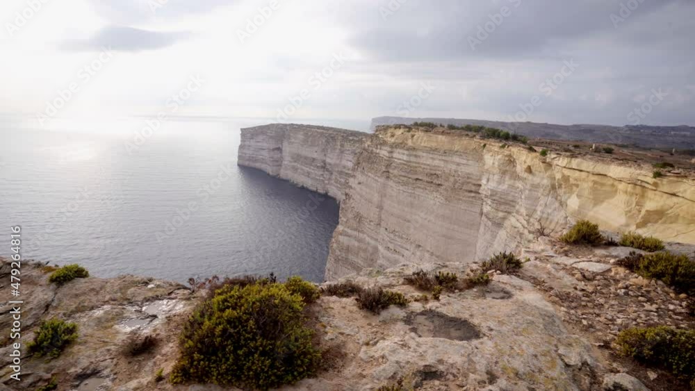 Sanap cliffs seen from edge in cloudy day. Gimbal traveling shot Sanap cliffs seen from edge in cloudy day. Gimbal traveling shot