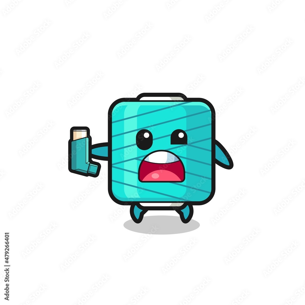 yarn spool mascot having asthma while holding the inhaler yarn spool mascot having asthma while holding the inhaler