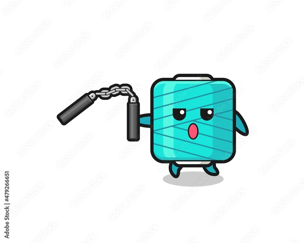 cartoon of yarn spool using nunchaku cartoon of yarn spool using nunchaku