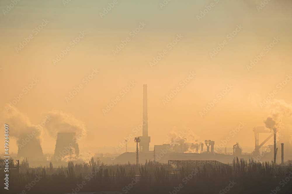 Chimneys for metallurgy. Heavy industry landscape. Air pollution from smoke and gas. Smog background. Global warming concept. Dawn industrial factory. Destruction of the ozone layer. Toxic emissions. Chimneys for metallurgy. Heavy industry landscape. Air pollution from smoke and gas. Smog background. Global warming concept. Dawn industrial factory. Destruction of the ozone layer. Toxic emissions.