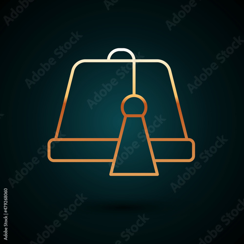 Gold line Turkish hat icon isolated on dark blue background. Vector