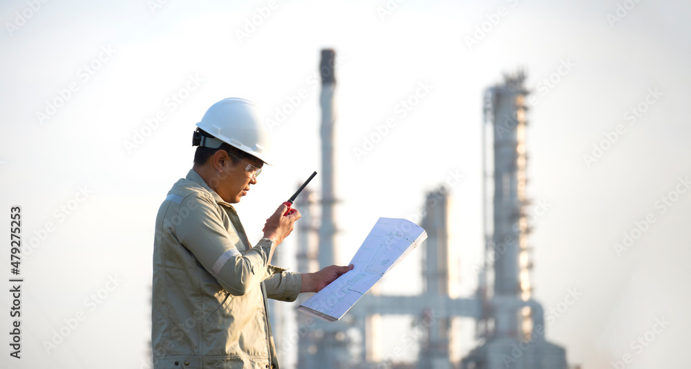 Architect at work in a construction site Engineers man construction safety work concept and construction city .Engineer Concept Architect at work in a construction site Engineers man construction safety work concept and construction city .Engineer Concept