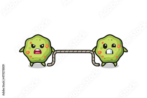 cute puke character is playing tug of war game