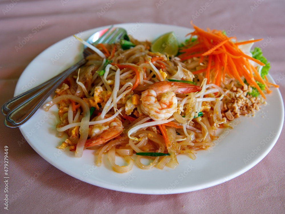 Stir fried rice noodle thai style with shrimps and vegetables Pad Thai kung sod ,food popular with Thai and foreigners. Have a delicious national taste good. Stir fried rice noodle thai style with shrimps and vegetables Pad Thai kung sod ,food popular with Thai and foreigners. Have a delicious national taste good.