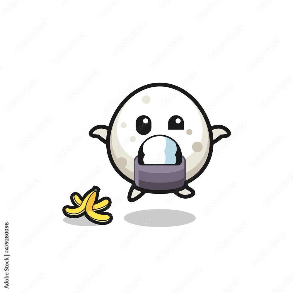 Obraz premium onigiri cartoon is slip on a banana peel