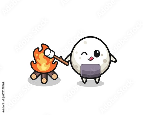 onigiri character is burning marshmallow