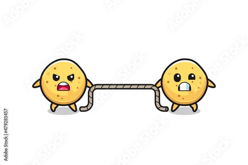 cute potato chip character is playing tug of war game
