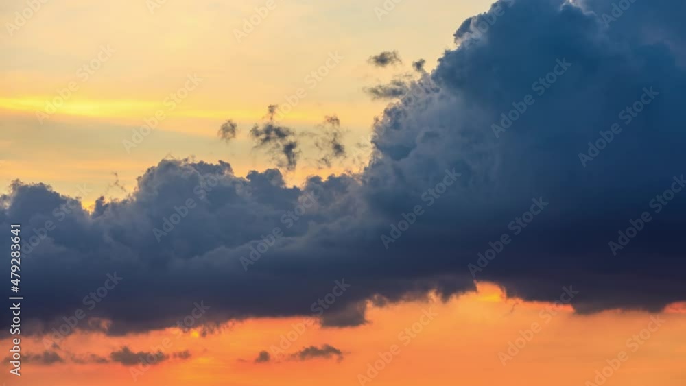 4k time lapse. Dark clouds roll in the sky. Beautiful sky clouds at sunset. Colorful cloudscape on blue sky. 4k time lapse. Dark clouds roll in the sky. Beautiful sky clouds at sunset. Colorful cloudscape on blue sky.